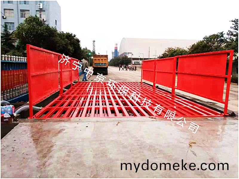 稷山(shan)銘(ming)福鋼鐵(tie)有(you)限公司(si) 9*4.5*1.2M-200T平闆式洗(xi)車(che)機